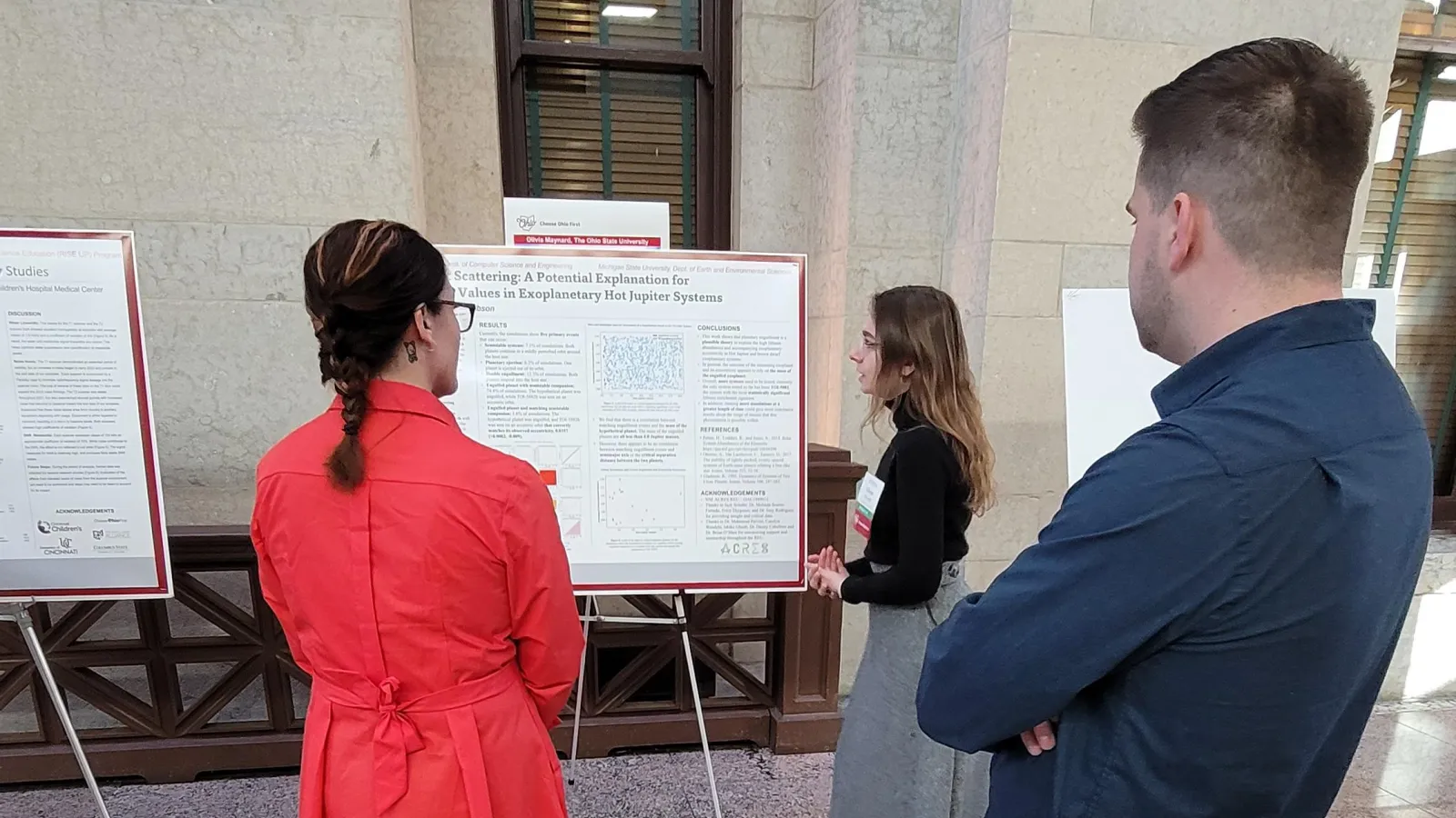 Olivia presenting poster presentation