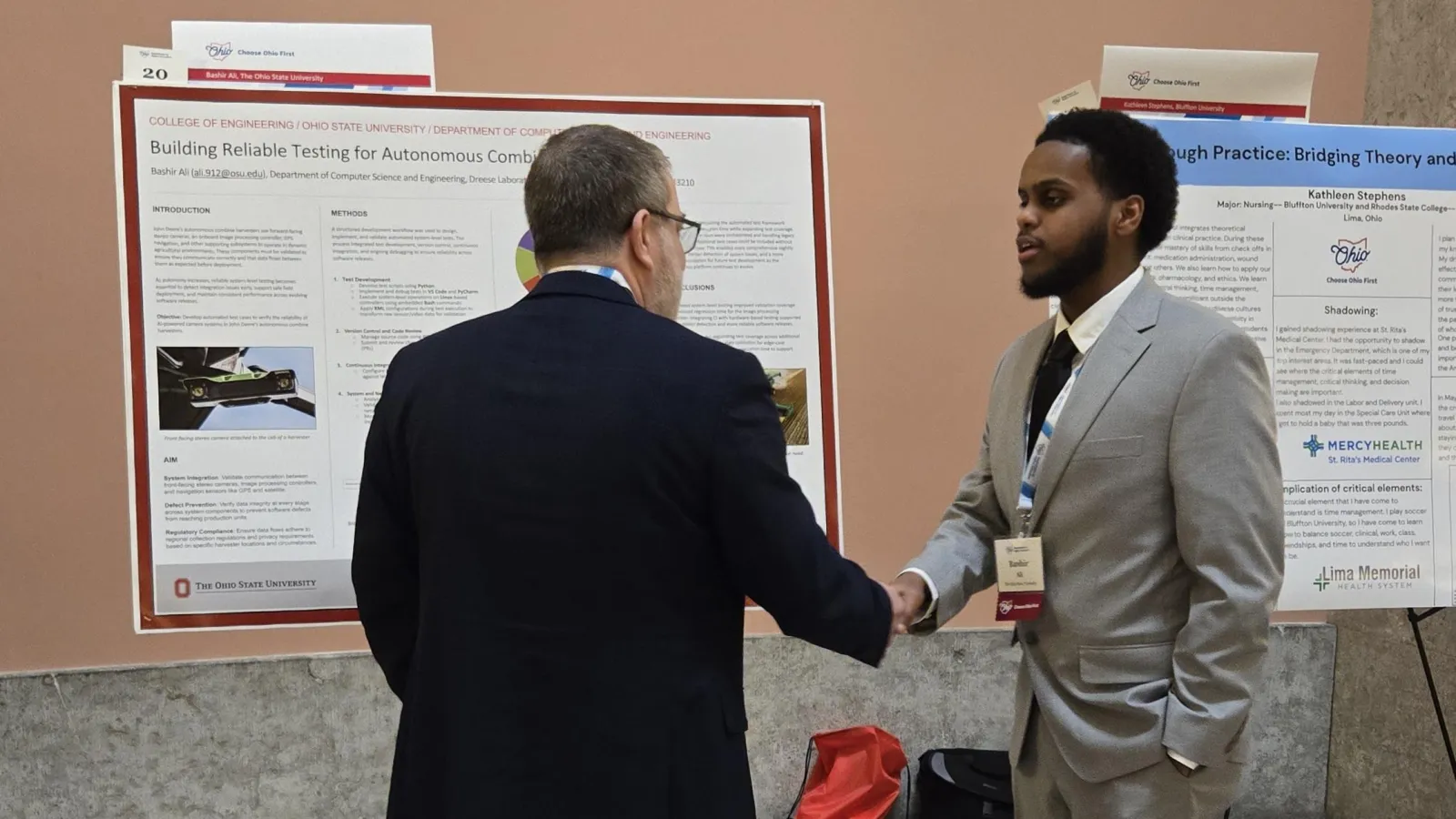 Bashir presenting his poster