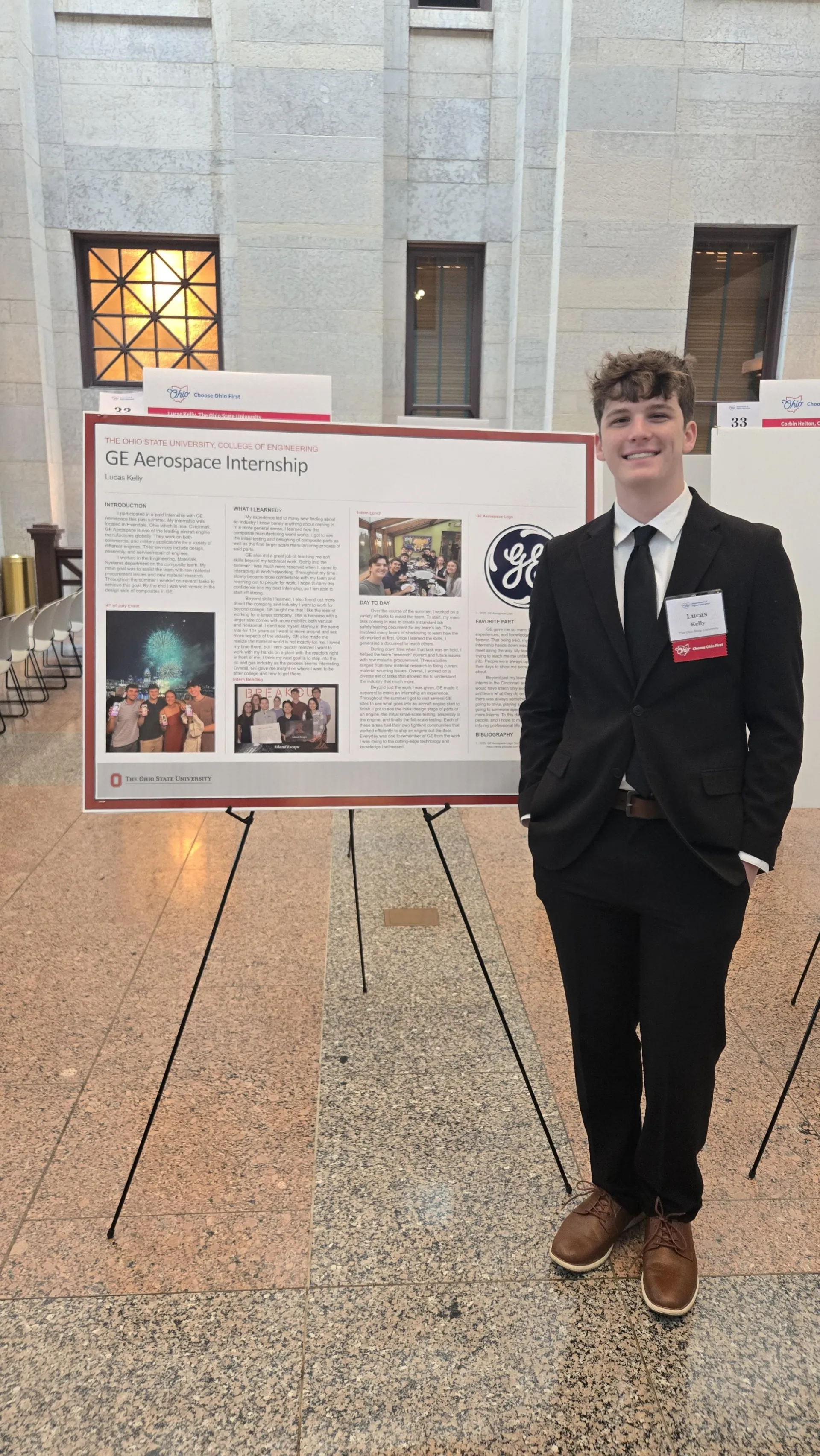 Lucas Kelly by his poster at the Ohio Statehouse