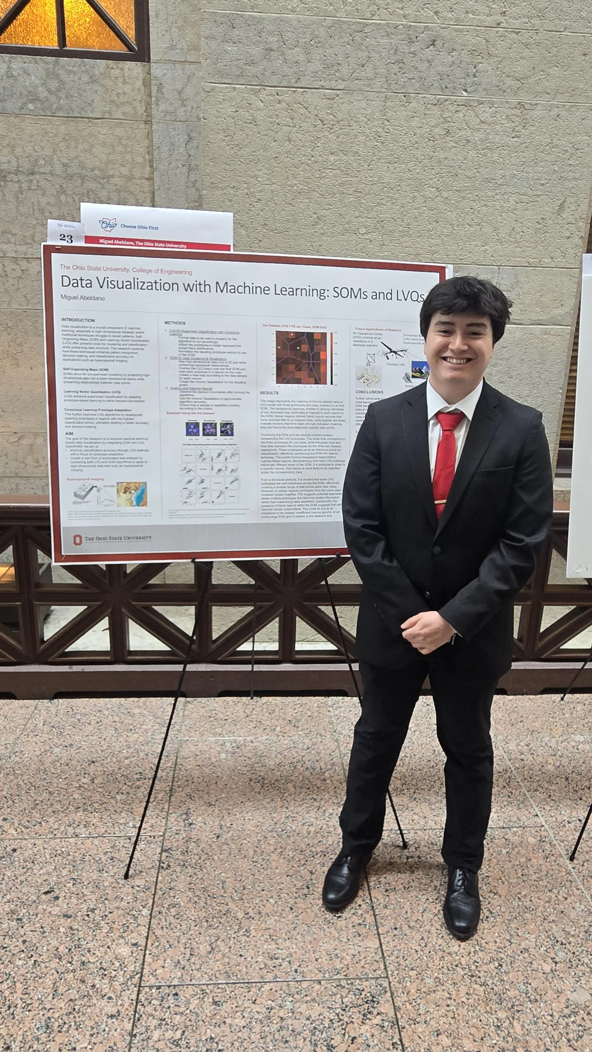 Miguel by his poster at the Ohio Statehouse