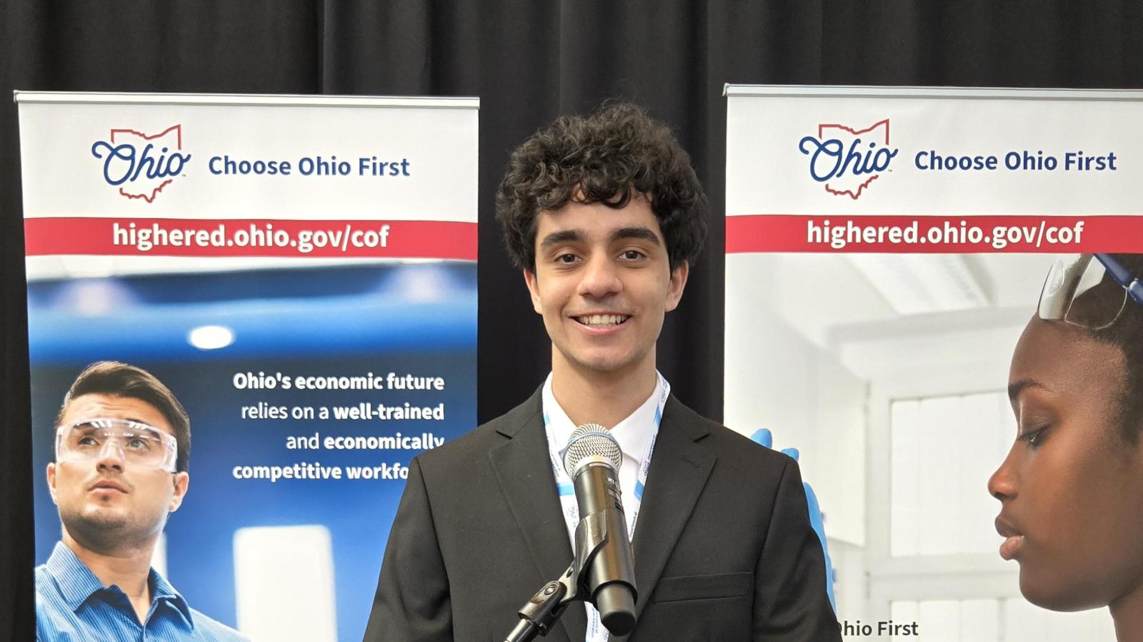 Faisal at the Ohio Statehouse podium