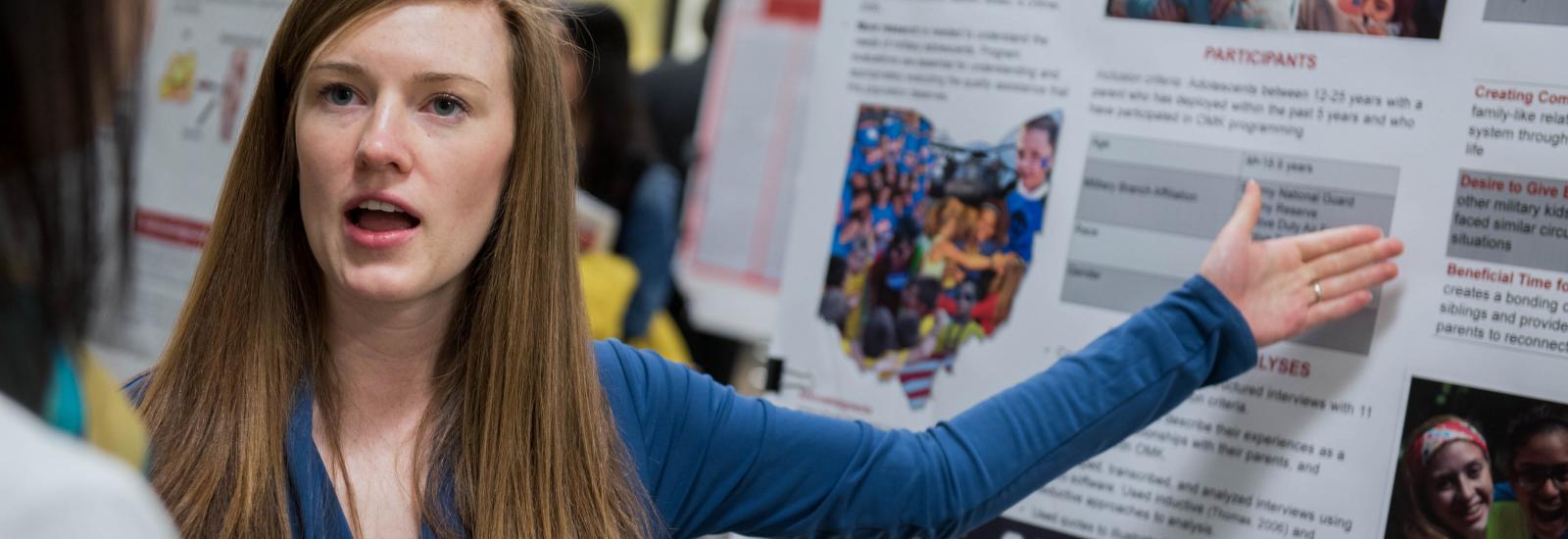 An Ohio State poster board presenter An Ohio State poster board presenter